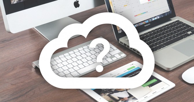 Molnet med apple, google drive och Amazon cloud drive service. På bilden en iMac, Macbook, iPad och ett Apple Wireless Keyboard.