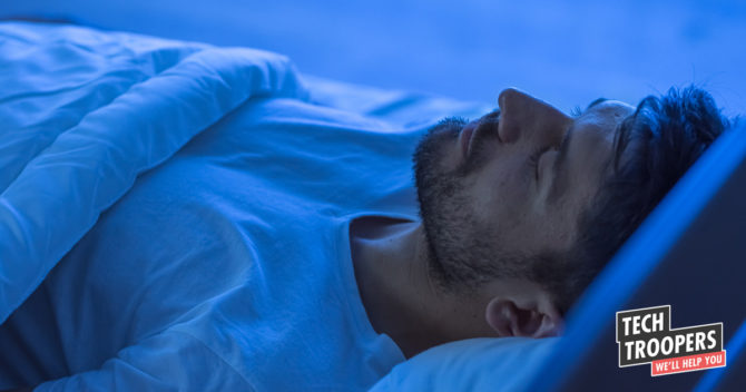Man sleeping blue light faded