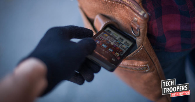 Image og hand steal smartphone from bag